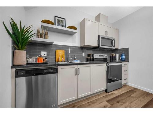 133 Corner Meadows Way Ne, Calgary, AB - Indoor Photo Showing Kitchen With Stainless Steel Kitchen