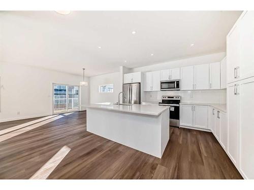 2066 Fowler Road Sw, Airdrie, AB - Indoor Photo Showing Kitchen With Upgraded Kitchen