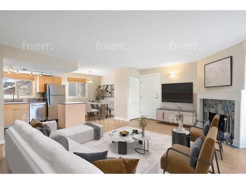 803-1540 29 Street Nw, Calgary, AB - Indoor Photo Showing Living Room With Fireplace