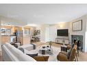 803-1540 29 Street Nw, Calgary, AB  - Indoor Photo Showing Living Room With Fireplace 