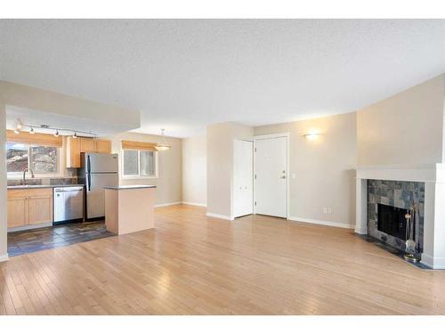 803-1540 29 Street Nw, Calgary, AB - Indoor With Fireplace