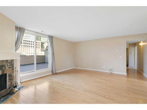 803-1540 29 Street Nw, Calgary, AB - Indoor With Fireplace