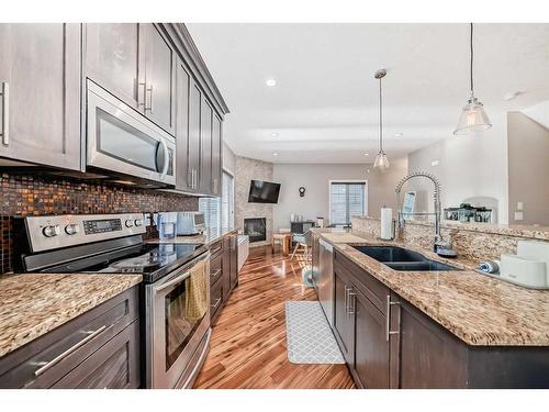 3-311 15 Avenue Ne, Calgary, AB - Indoor Photo Showing Kitchen With Stainless Steel Kitchen With Double Sink With Upgraded Kitchen