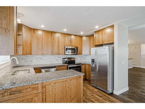 56 Arbour Cliff Court Nw, Calgary, AB - Indoor Photo Showing Kitchen With Stainless Steel Kitchen