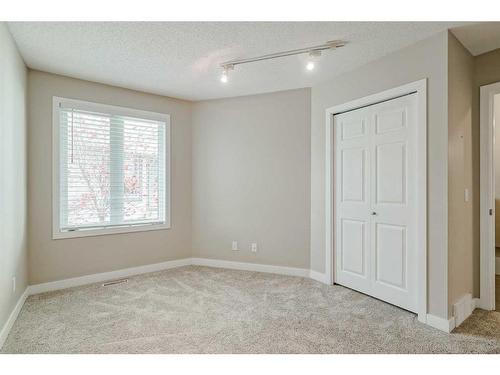 56 Arbour Cliff Court Nw, Calgary, AB - Indoor Photo Showing Other Room