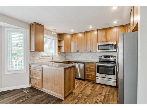 56 Arbour Cliff Court Nw, Calgary, AB - Indoor Photo Showing Kitchen With Stainless Steel Kitchen