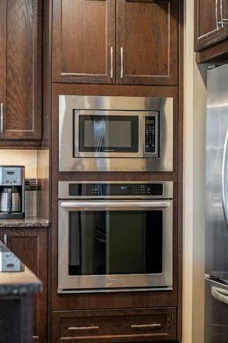 5 Masters Park Se, Calgary, AB - Indoor Photo Showing Kitchen With Stainless Steel Kitchen