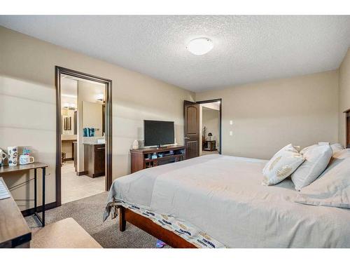 5 Masters Park Se, Calgary, AB - Indoor Photo Showing Bedroom