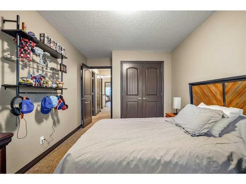 5 Masters Park Se, Calgary, AB - Indoor Photo Showing Bedroom