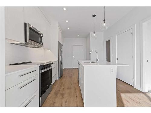 2418-395 Skyview Parkway Ne, Calgary, AB - Indoor Photo Showing Kitchen With Upgraded Kitchen