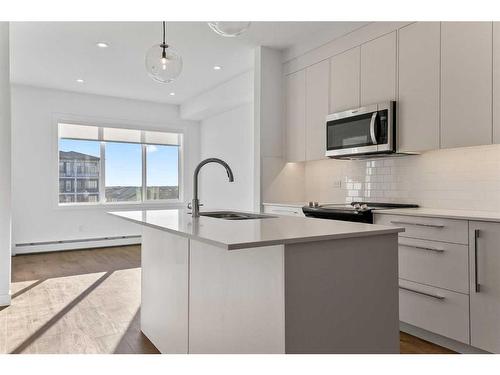 2418-395 Skyview Parkway Ne, Calgary, AB - Indoor Photo Showing Kitchen With Upgraded Kitchen