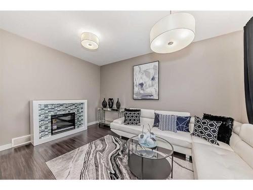 608 Skyview Ranch Grove Ne, Calgary, AB - Indoor Photo Showing Living Room With Fireplace