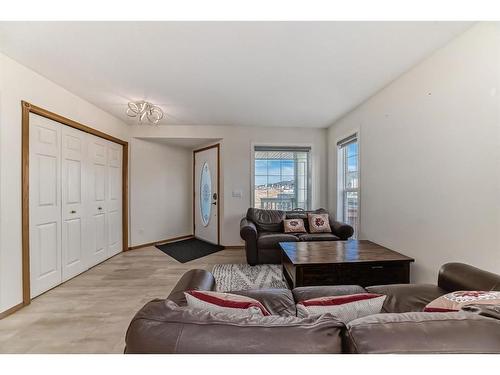 25 Taracove Way Ne, Calgary, AB - Indoor Photo Showing Living Room