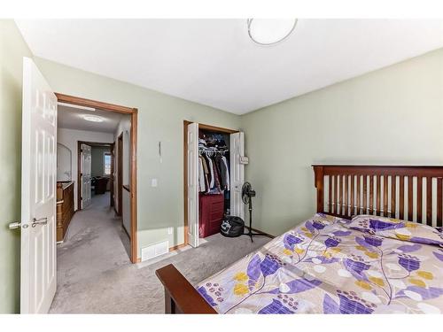 25 Taracove Way Ne, Calgary, AB - Indoor Photo Showing Bedroom