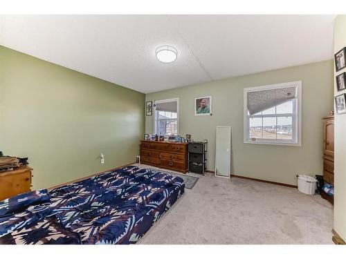 25 Taracove Way Ne, Calgary, AB - Indoor Photo Showing Bedroom