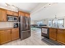 25 Taracove Way Ne, Calgary, AB  - Indoor Photo Showing Kitchen 