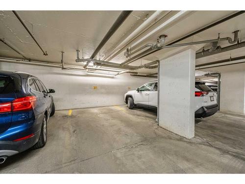 304-8 Sage Hill Terrace Nw, Calgary, AB - Indoor Photo Showing Garage