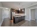 304-8 Sage Hill Terrace Nw, Calgary, AB  - Indoor Photo Showing Kitchen With Stainless Steel Kitchen With Upgraded Kitchen 