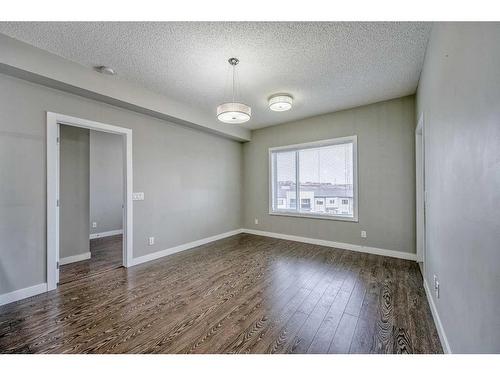 304-8 Sage Hill Terrace Nw, Calgary, AB - Indoor Photo Showing Other Room