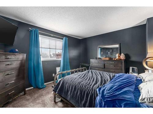 66 Everglade Drive Se, Airdrie, AB - Indoor Photo Showing Bedroom