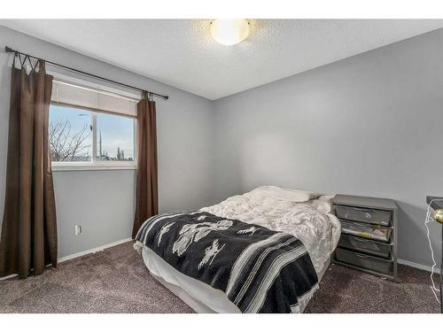 66 Everglade Drive Se, Airdrie, AB - Indoor Photo Showing Bedroom