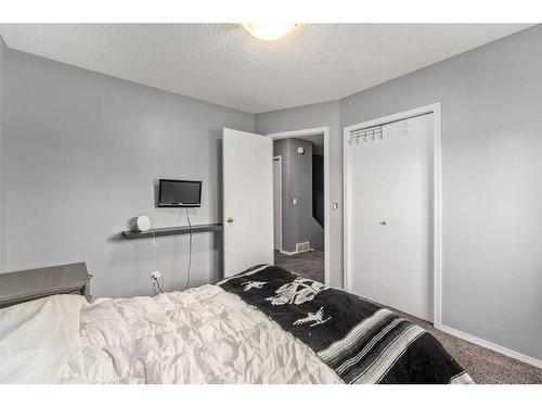 66 Everglade Drive Se, Airdrie, AB - Indoor Photo Showing Bedroom