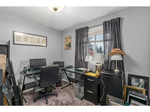 66 Everglade Drive Se, Airdrie, AB - Indoor Photo Showing Office