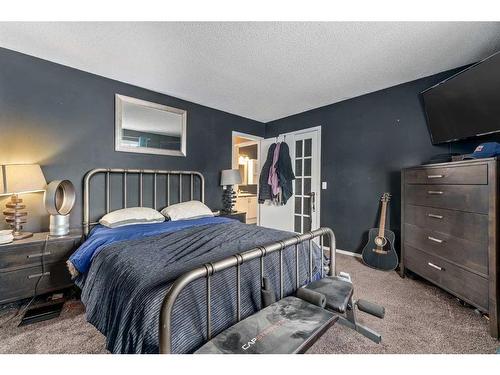 66 Everglade Drive Se, Airdrie, AB - Indoor Photo Showing Bedroom