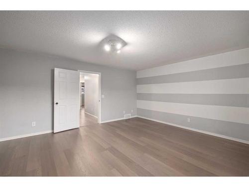 74 Canals Circle Sw, Airdrie, AB - Indoor Photo Showing Other Room