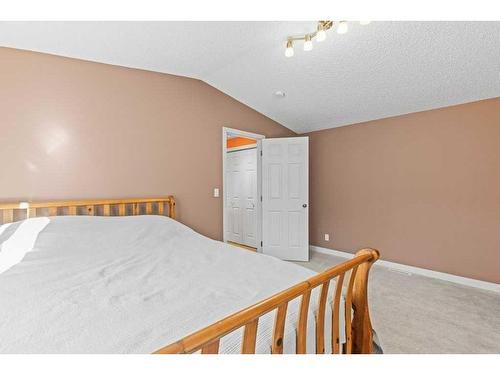 56 Grotto Way Ne, Canmore, AB - Indoor Photo Showing Bedroom