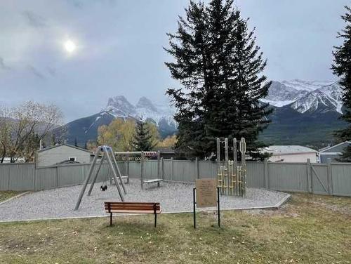 56 Grotto Way Ne, Canmore, AB - Outdoor With Backyard