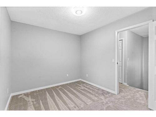 13-2519 38 Street Ne, Calgary, AB - Indoor Photo Showing Other Room