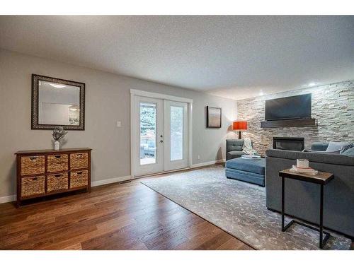 3727 37 Street Nw, Calgary, AB - Indoor Photo Showing Living Room With Fireplace