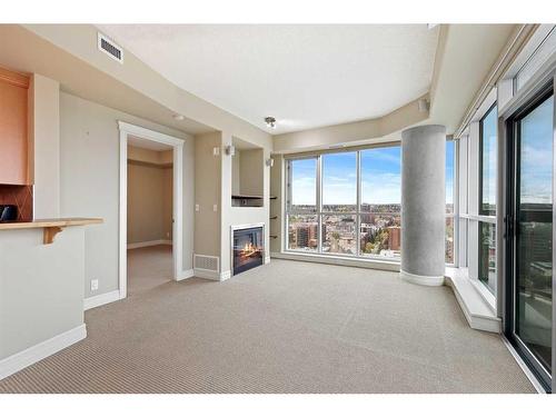 1905-836 15 Avenue Sw, Calgary, AB - Indoor With Fireplace