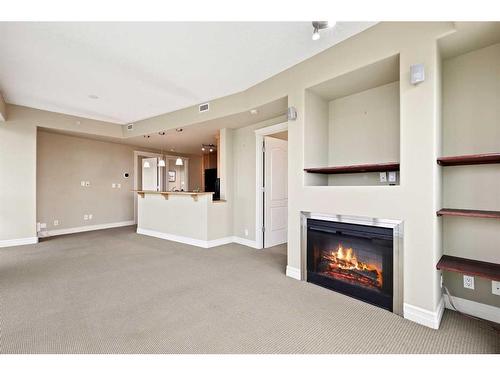 1905-836 15 Avenue Sw, Calgary, AB - Indoor With Fireplace