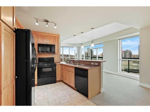 1905-836 15 Avenue Sw, Calgary, AB - Indoor Photo Showing Kitchen With Double Sink