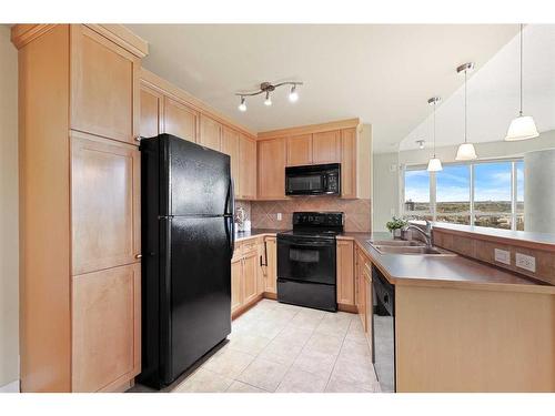 1905-836 15 Avenue Sw, Calgary, AB - Indoor Photo Showing Kitchen With Double Sink