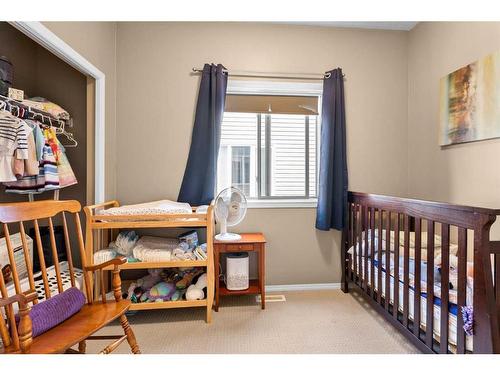 209 Valarosa Place, Didsbury, AB - Indoor Photo Showing Bedroom