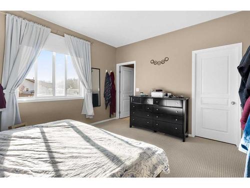 209 Valarosa Place, Didsbury, AB - Indoor Photo Showing Bedroom