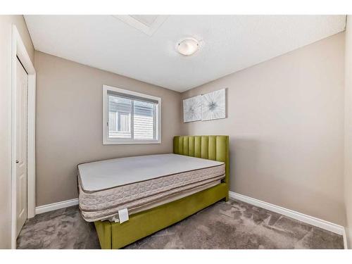 257 Bridlemeadows Common Sw, Calgary, AB - Indoor Photo Showing Bedroom