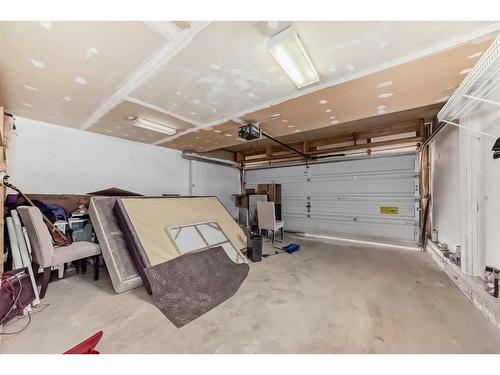 257 Bridlemeadows Common Sw, Calgary, AB - Indoor Photo Showing Garage