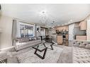 257 Bridlemeadows Common Sw, Calgary, AB  - Indoor Photo Showing Living Room 