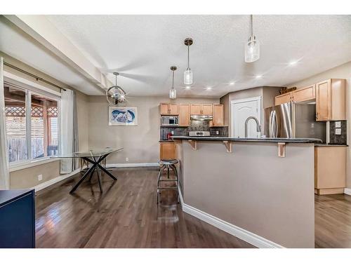 257 Bridlemeadows Common Sw, Calgary, AB - Indoor Photo Showing Kitchen With Upgraded Kitchen