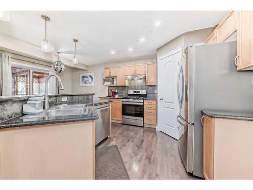 257 Bridlemeadows Common Sw, Calgary, AB - Indoor Photo Showing Kitchen With Stainless Steel Kitchen With Double Sink