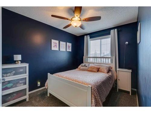 15 Cranfield Crescent Se, Calgary, AB - Indoor Photo Showing Bedroom