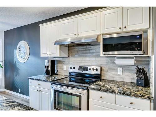 15 Cranfield Crescent Se, Calgary, AB - Indoor Photo Showing Kitchen With Upgraded Kitchen