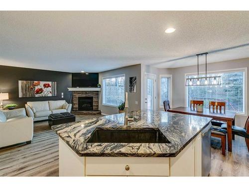 15 Cranfield Crescent Se, Calgary, AB - Indoor Photo Showing Other Room With Fireplace