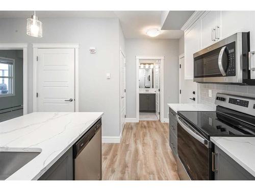 302-19661 40 Street Se, Calgary, AB - Indoor Photo Showing Kitchen