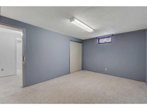 12 Penswood Place Se, Calgary, AB - Indoor Photo Showing Other Room