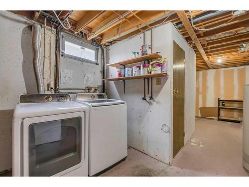 12 Penswood Place Se, Calgary, AB - Indoor Photo Showing Laundry Room